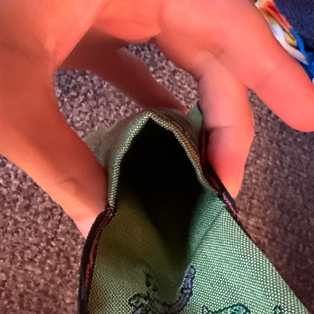 Green Embroidered Fabric Pouch for coins. Made in Japan. Recycled materials.
